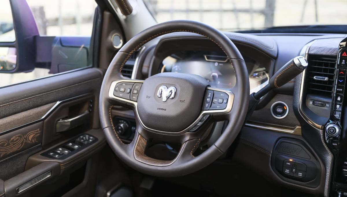 Display The steering wheel in a 2025 Ram 3500 Limited Longhorn.