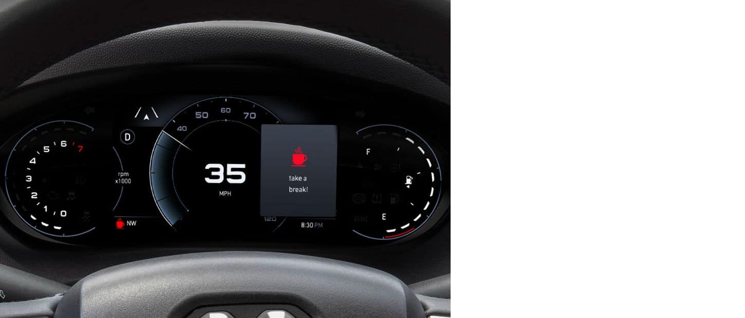 The Digital Cluster Display in the 2025 Ram ProMaster alerting the driver with a warning that reads "take a break!"