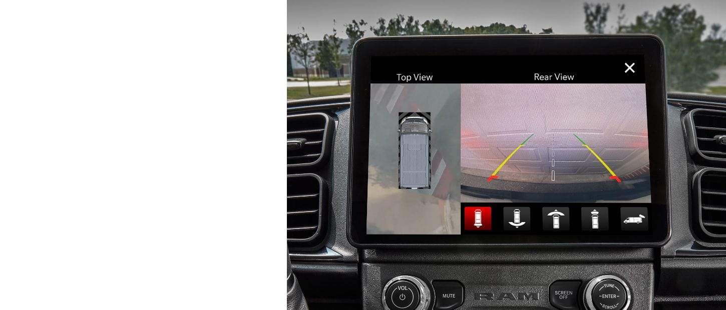 The Uconnect touchscreen in the 2025 Ram ProMaster displaying the top view and rear view from the 360-degree Surround View Camera.