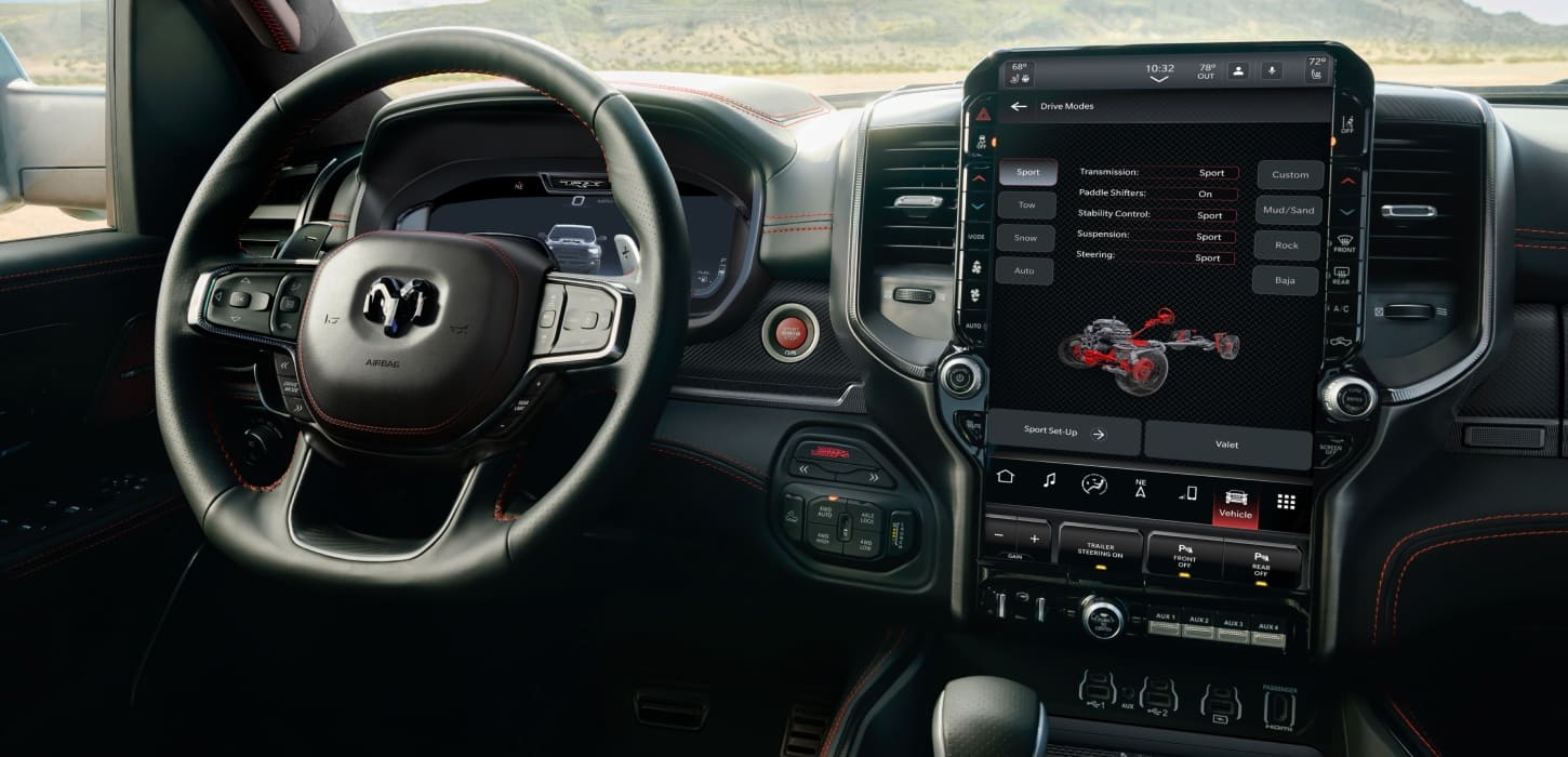 The Uconnect touchscreen in the 2026 Ram 1500 SRT TRX displaying one of the Drive Mode pages.