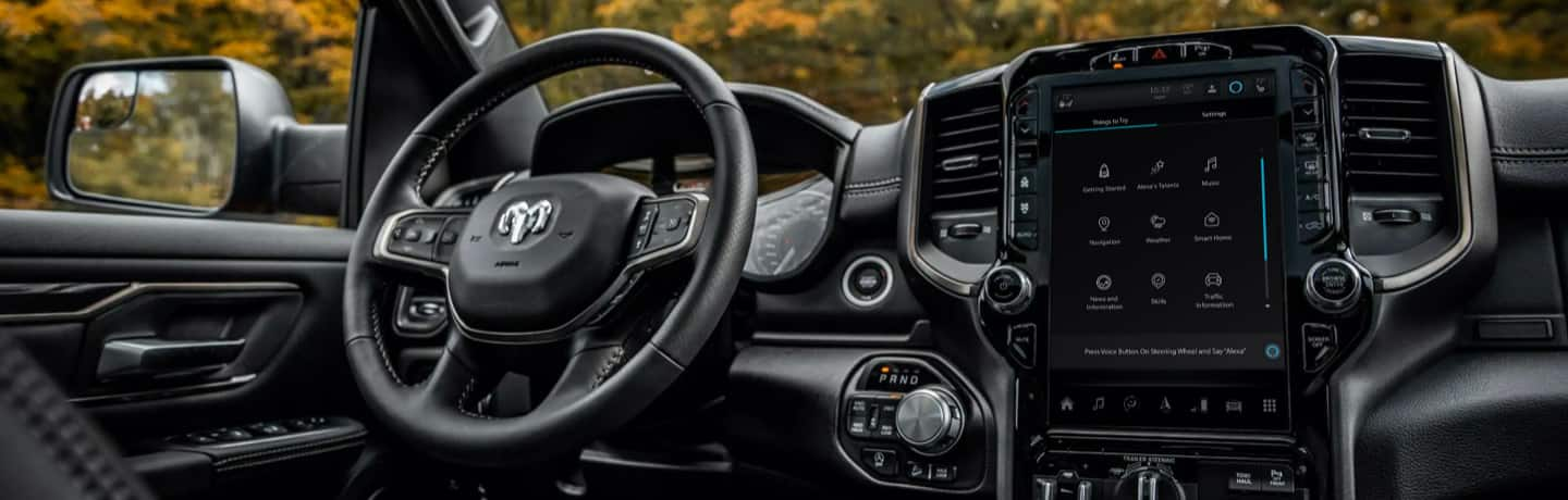 A close-up of Uconnect 5C NAV with 12-inch touchscreen in the 2024 Ram Limited with the Alexa selections displayed.